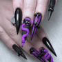 purple and black Halloween Themed Stiletto Nails